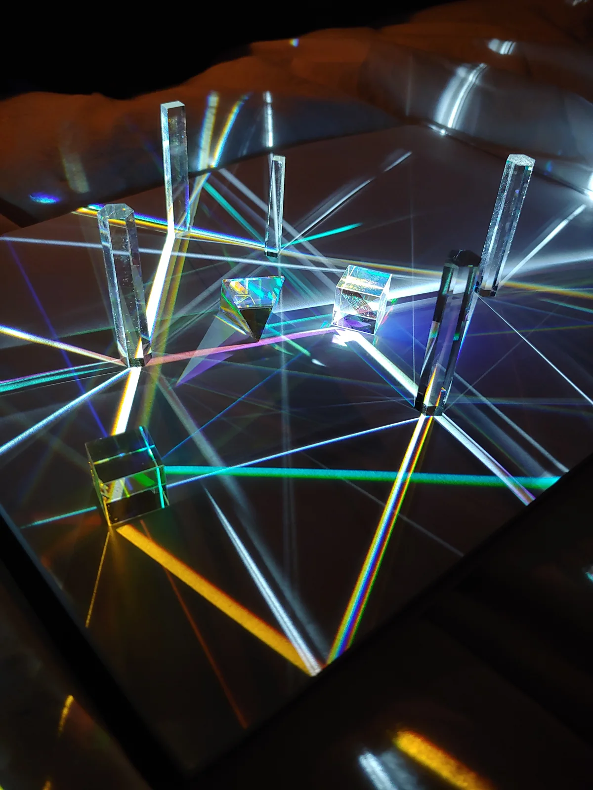A tabletop prototype made with mirrors and prisms.
