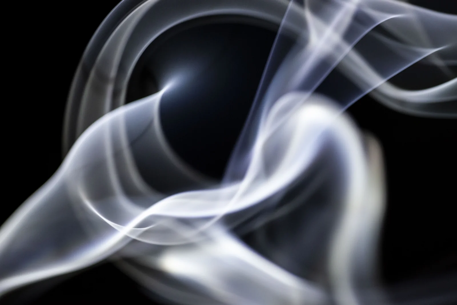 White light folded into flowing shapes.