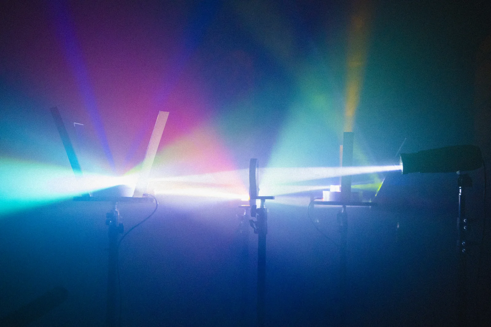 Coloured rays fan across the installation.