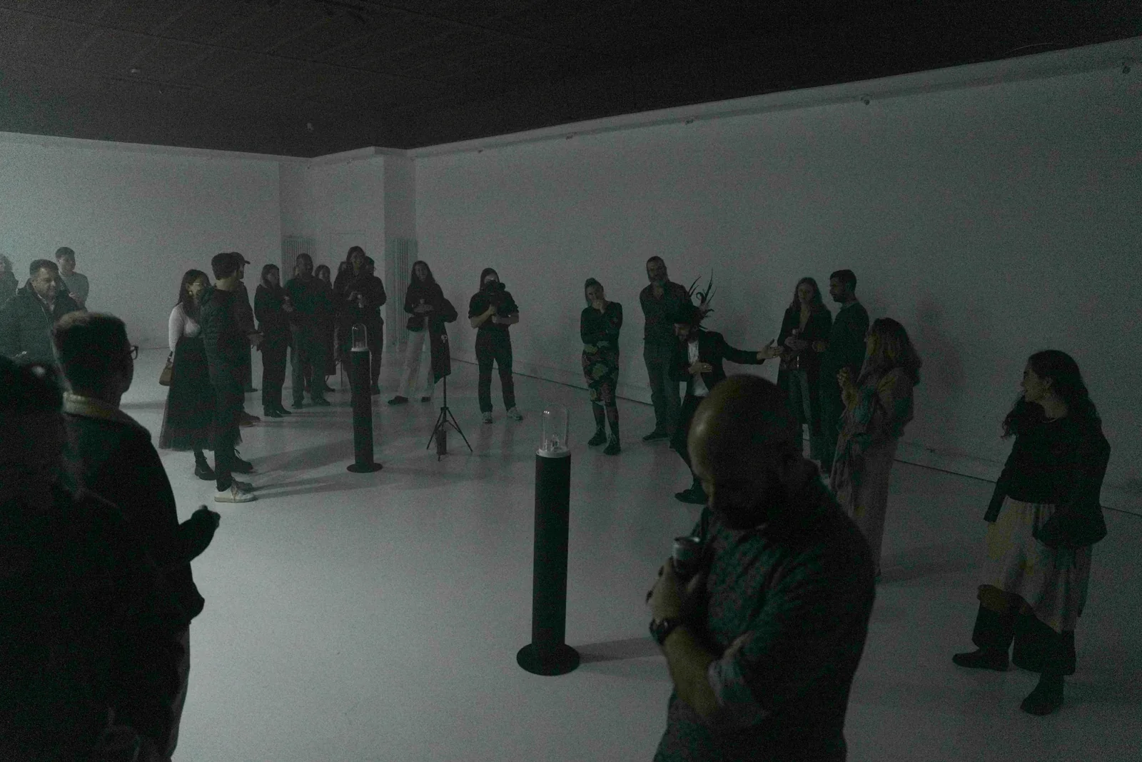 Visitors exploring the final installation in the gallery.